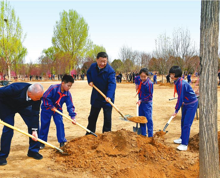 習近平在參加首都義務植樹活動時強調 發揚中華民族愛樹植樹護樹好傳統 推動國土綠化不斷取得實實在在的成效